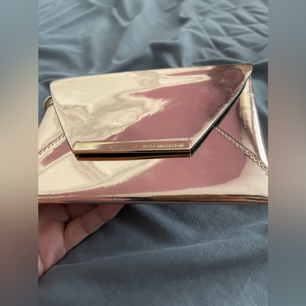 BCBG rose gold wristlet
